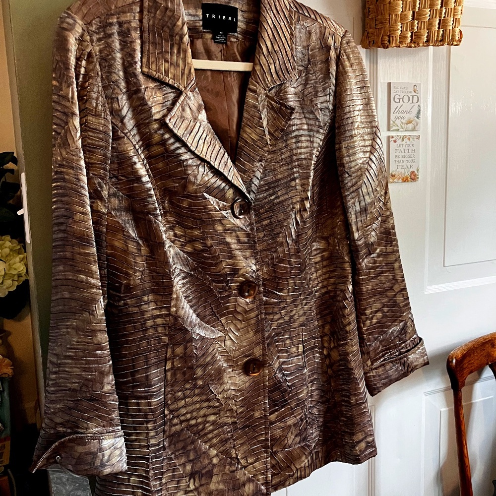 Tribal brand, size 10, Medium Brown tones animal print